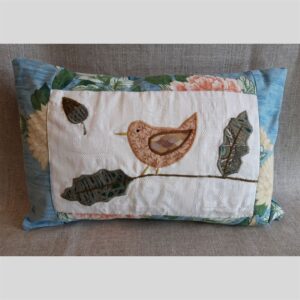The Sussex Guild Wren on a branch cushion Louise Bell 1