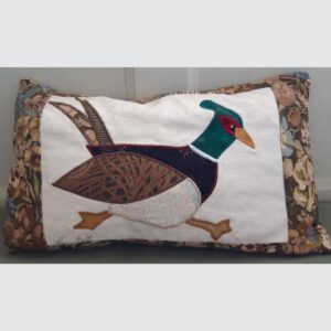 The Sussex Guild Pheasant cushion in tawney colours  1