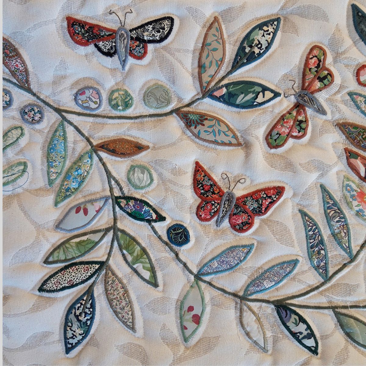 The Sussex Guild Butterfly Bed Runner in pale green Louise Bell 1