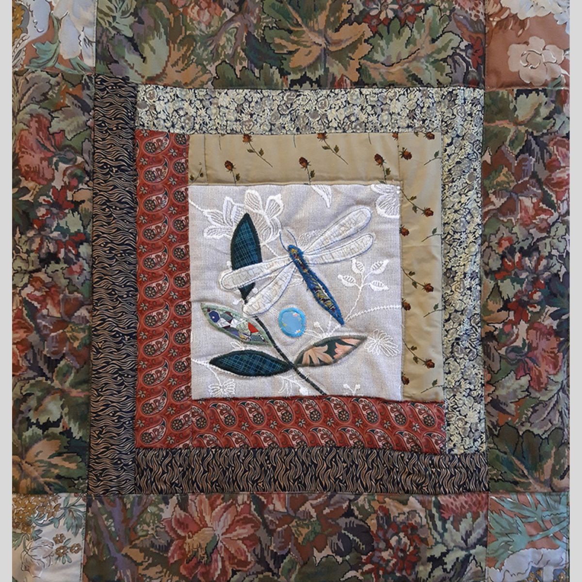 The Sussex Guild Tawney quilt with Butterflies and moths Louise Bell 1