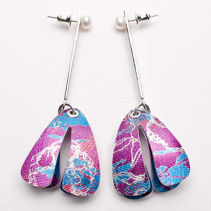 Pink and blue aluminium earrings by Lorraine Gibby.