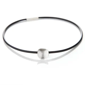 The Sussex Guild Oval pendant on rubber choker