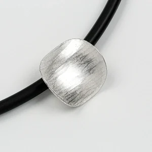 The Sussex Guild Oval pendant on rubber choker 1