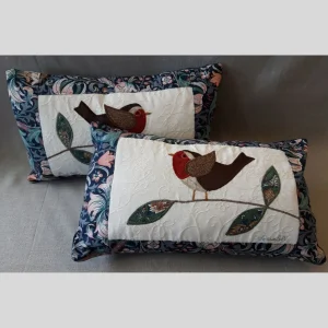 The Sussex Guild Robin cushion in blue