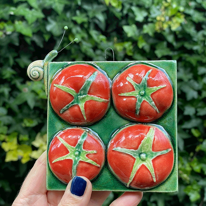 Ceramics-Angela-Evans-Tomato-Tile-with-snail-visitor